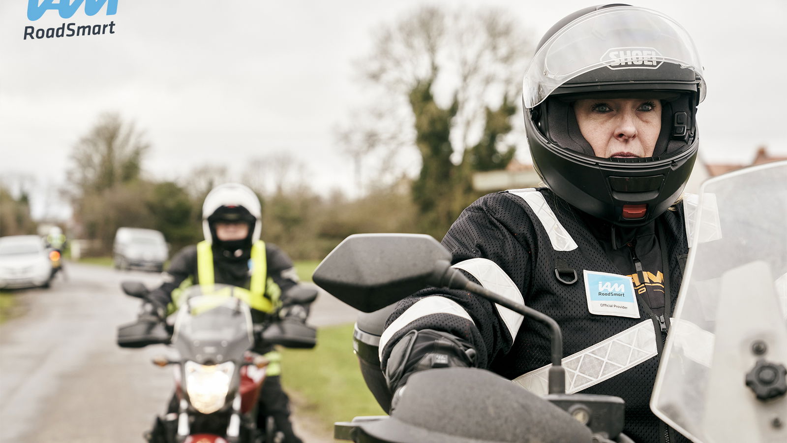 IAM Advanced Riding - Close up of two riders riding out together.